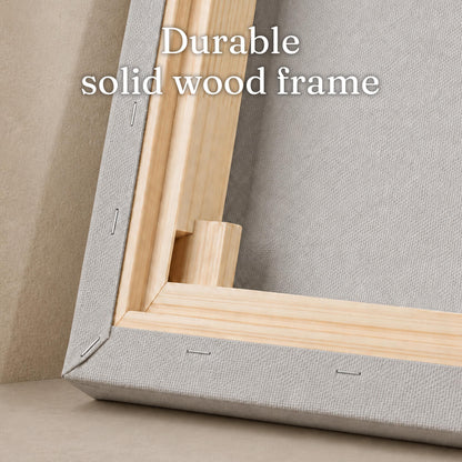 Close-up of the canvas back corner showing the solid wood stretcher bar frame and staple construction
